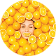 Woman smiling among fresh yellow citrus fruits