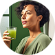 Woman enjoying healthy green juice drink
